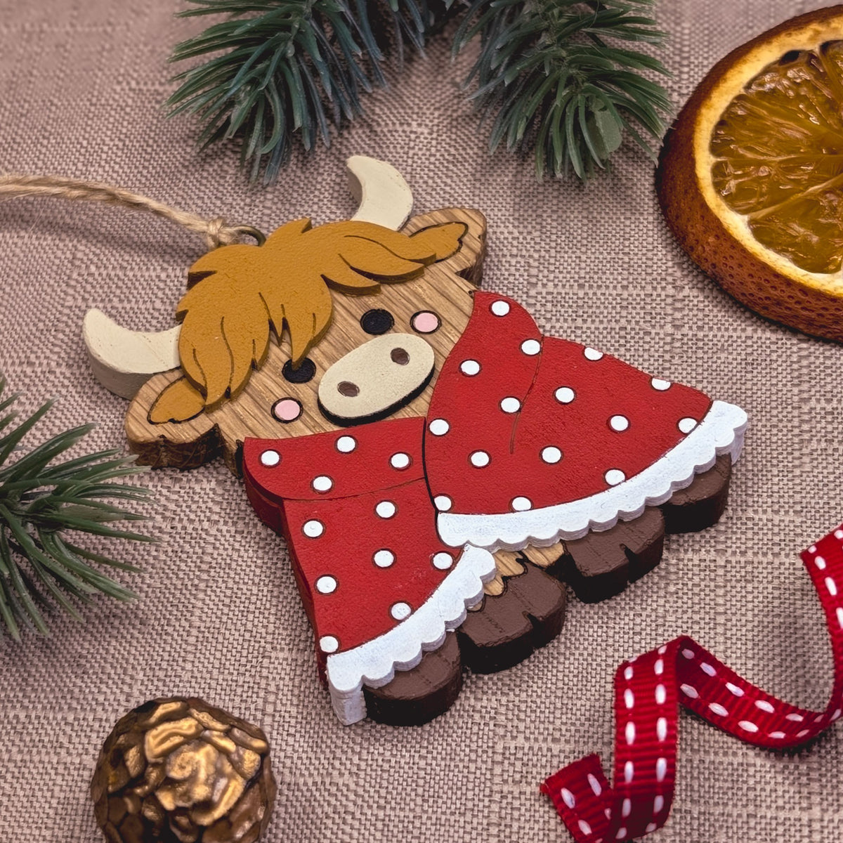 Highland cow in blanket hanging decoration